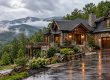 Highlands mountain home in misty conditions illustrating routine condition checks and local property oversight.