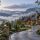 Highlands mountain home surrounded by misty mountains illustrating local home oversight for absentee owners.