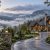 Highlands mountain home surrounded by misty mountains illustrating local home oversight for absentee owners.